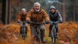 © Anastasiya - A group of elderly friends cycling together through a forest during autumn