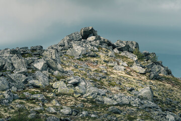 Wall Mural - Rocks on a top from the eastern part of the Rondane Mountains in late summer.