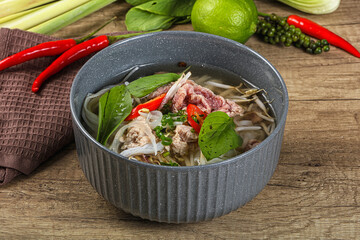 Wall Mural - Vietnamese Pho Bo soup with beef