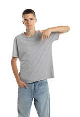 Wall Mural - Teenage boy wearing grey t-shirt on white background