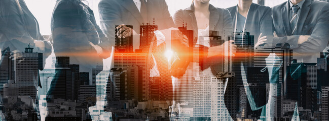 Wall Mural - double exposure image of many business people conference group meeting on city office building in ba