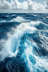 Canvas Print - Powerful ocean wave crashing near tropical shoreline with mountains in the background