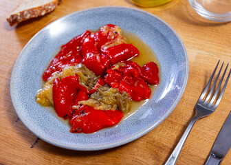 Wall Mural - Appetizing salad of roasted bell peppers and eggplant served on plate