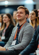 © Julia Zarubina - people with badges listening to speaker at conference, manager, office worker, entrepreneur, businessman, employee, professional, student, meeting, group, team, exhibition, seminar, briefing, coaching