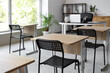 © Pixel-Shot - Desks and chairs in modern empty classroom