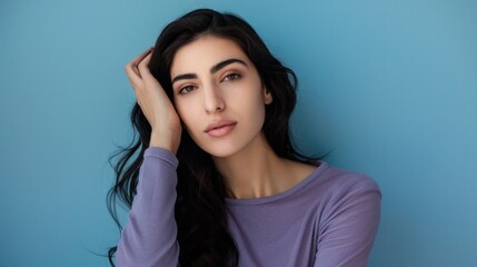 Poster - Poised Middle Eastern woman in purple top, determination and strength portrait.