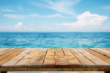 Wall Mural - Wooden Tabletop Against Blurred Ocean and Sky Background