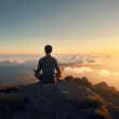 © Medo - person meditating on the top of the mountain