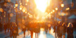 © S.JR Stocker - A blurred background of people walking in a city center during sunset, with a focus on the bokeh effect.