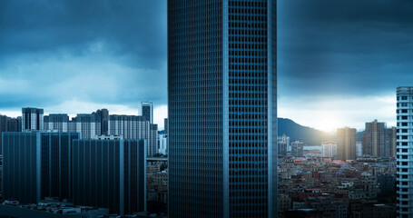 Wall Mural - dark stormy clouds over the city