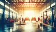 © Dn Uttam - Blurred abstract image of a mechanic service center, featuring vague outlines of cars and tools, creating a soft, dreamlike atmosphere in a car care station background