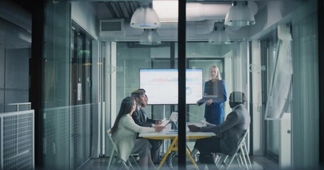 Poster - Young Talented Female Making a Presentation to an Investment Company in a Meeting Room. Project Manager Using a Digital Interactive Whiteboard to Show Company Performance, Sales and Revenue Data