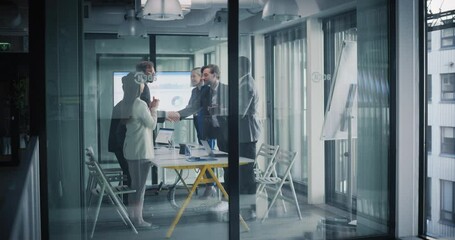 Aufkleber - Multiethnic Group Having a Business Meeting in a Conference Room. Young People Looking at Analytical Data on Screen. Participants Agree on a Deal, Shake Hands and Celebrate a Successful Investment