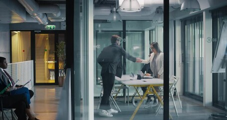 Aufkleber - HR Department Meeting with Job Candidates in a Modern Office. Young Man Enters the Room with His CV, Greeting the Interviewers. Employees Discussing Qualifications and Relevant Skills for the Job