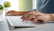 © marcelinopozo - A man is using a computer mouse on a desk