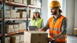 © N7 - Warehouse staff loading goods onto a pallet, with shelves and inventory in the background.
