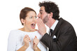 © pathdoc - Young man whispering a secret, shocking news to a stunned offended woman