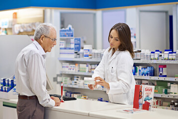 Woman, pharmacist and elderly man with box for consultation, medicine prescription or healthcare advice. Medical, customer and discussion for product instructions, pharmaceutical opinion and pharmacy