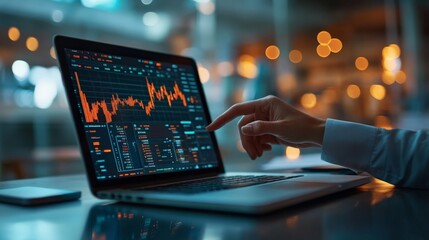 Poster - A person analyzing dynamic stock market trends displayed on a laptop screen within a modern office, reflecting financial activities and strategic decision making in the workplace.