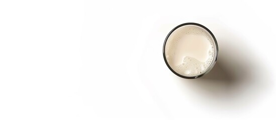 Poster - A glass of milk against a white background Top view Copy space Isolated