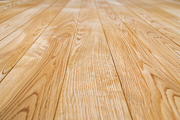 Light brown wooden laminate floor close up.