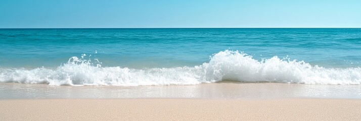 Tranquil Beach Scene with Gentle Waves and Clear Blue Sky - A serene beach scene with gentle waves breaking on the sandy shore, under a clear blue sky, symbolizing tranquility, peace, relaxation, free