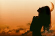 © Evangelina - Silueta de mujer con efecto de doble exposición y fondo de cielo en tonos cálidos. Ciclos lunares. Atardecer. Paz y tranquilidad. Mundo interior. Pasión y deseo