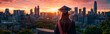 © Studio-FI - Young graduate looking at new horizons and opportunities looking out onto a vast city at sunrise concept