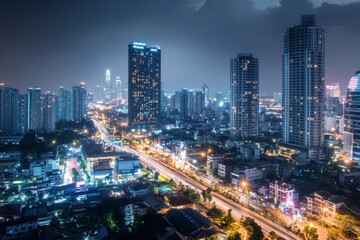 Wall Mural - The skyline reveals an illuminated smart city at night with energy-efficient buildings softly lit, showcasing urban innovation and sustainability in a metropolitan setting