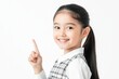© Zaleman - Portrait of a pretty attractive confident glad cheerful straight-haired preteen girl pointing aside an advert ad tips feedback sale discount set against a colorful bright vivid yellow background