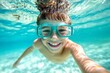 © Zaleman - Portrait of a child wearing swimming goggles having fun in a pool during summer