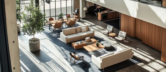 Wall Mural - Modern Office Lobby with White Couches and a Large Green Plant