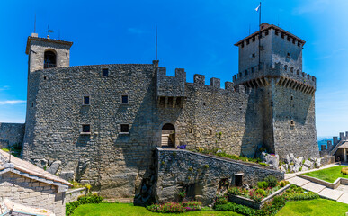 Wall Mural - A view across the first tower in the fortified section of San Marino, Italy in summertime