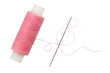 © Gudman - Old spool of thread and needle on a white background. Sewing accessories