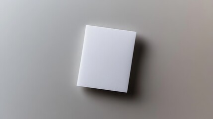 Wall Mural - A white square with a shadow on it