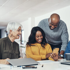 Canvas Print - Creative, business people and laughing in office with smartphone for social media meme, joke and positive feedback. Copywriting team, diversity and happy for good review, client approval or milestone