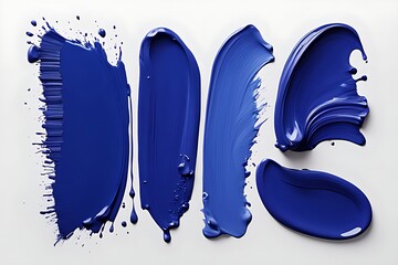 Set of dark blue paint brushstrokes with splashes on a white background. Close-up abstract design elements for print and graphic design