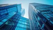 © NusratJahan - Blue glass skyscrapers, modern business center architecture background
