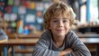 © nataliya_ua - boys sitting at his desk in a classroom.