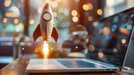 Rocket launch from laptop on office table to fly up in air. Business startup new idea project development, internet marketing strategy growth, future product progress on a website, speed power boost