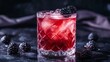 © fivan - A creative Bramble cocktail with blackberry garnish, isolated on a dark background with bold, moody lighting