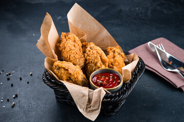 Sticker - Fried snack chicken nuggets with ketchup.