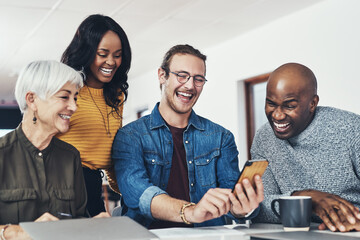 Canvas Print - Phone, laughing and happy business people in office for chat, conversation and online on break. Creative company, startup and men and women on smartphone for funny meme, joke and humor in workplace