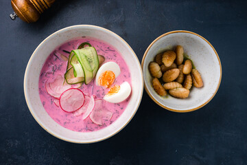 Wall Mural - Beetroot soup with kefir, cucumber, egg and radish in bowl.