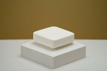 Sticker - White Cube on White Platform Against Beige Background