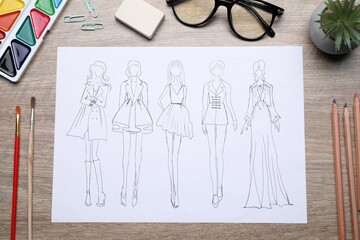 Poster - Sketch of stylish clothes and other fashion designer`s supplies on wooden table, flat lay