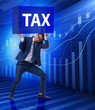 © Elnur - Man under the burden of tax payments