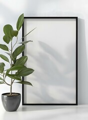 Wall Mural - Minimalist Home Decor with Plant and Blank Picture Frame