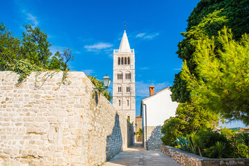 Street and cathedral tower view in town of Rab, Croatia