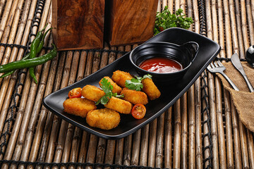 Wall Mural - Crispy golden choclen nuggets with sauce